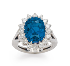 Sapphire and diamond 'Lady Di' style ring, set in 18-karat white gold.
